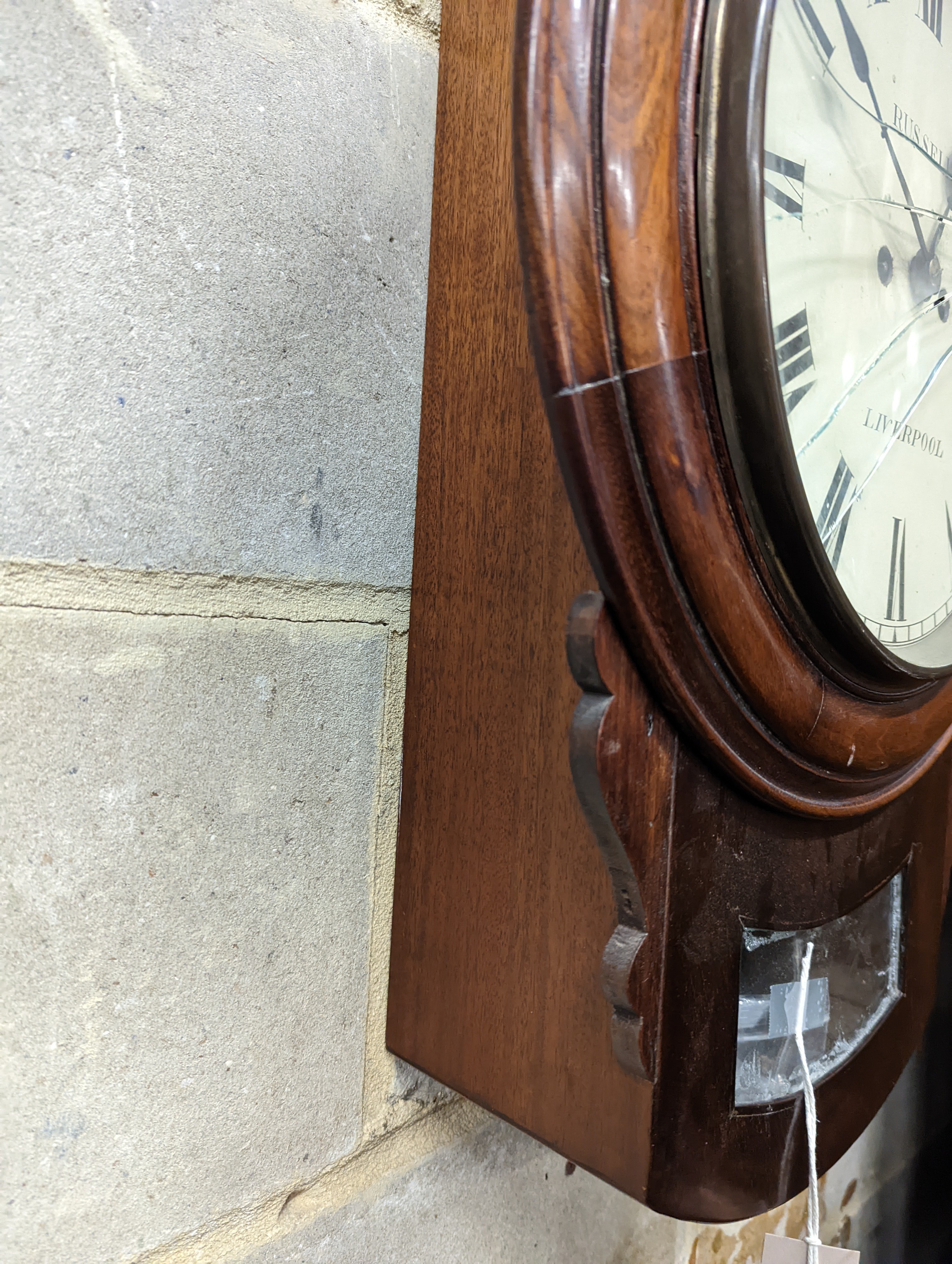 A Victorian mahogany drop dial wall clock, with twin fusee movement, and circular white painted Roman dial signed 